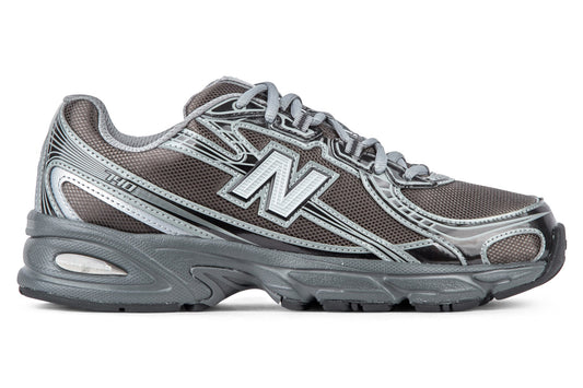 New Balance U7407YI - Castlerock/Black Metallic